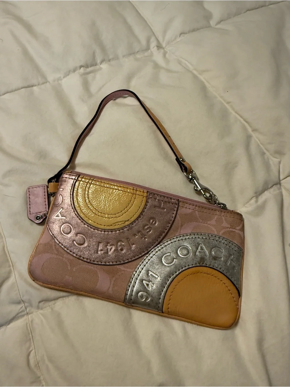 Coach Pink Signature Wristlet with Metallic Silver and Gold Accents